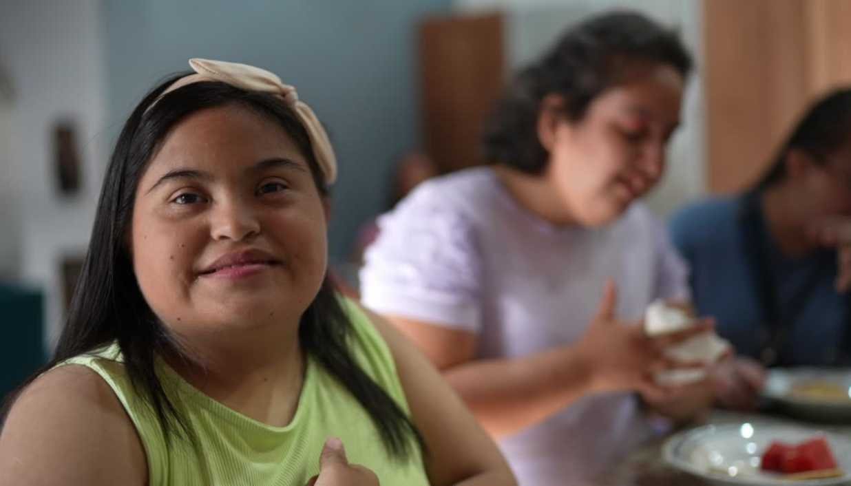 Young woman smiling while training for the workplace. Landscape orientation. Looking at the camera.